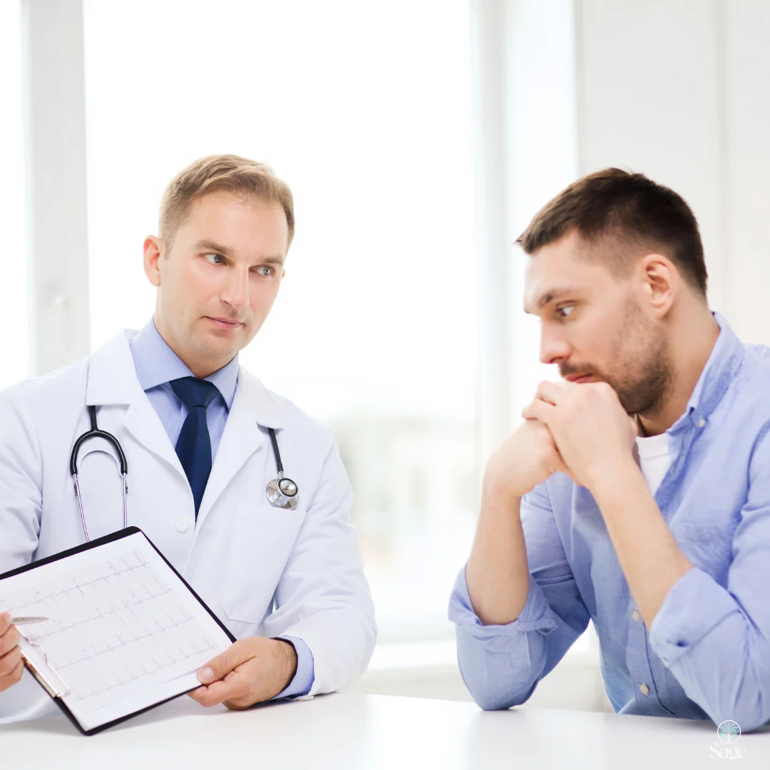 Doctor consulting with a male patient about testosterone replacement therapy